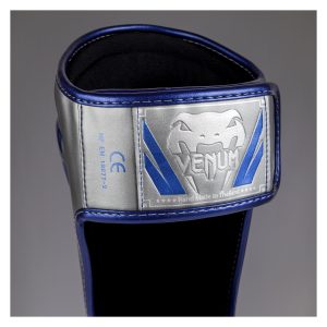 venum canillera elite plata/azul