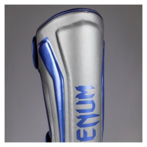 venum canillera elite plata/azul