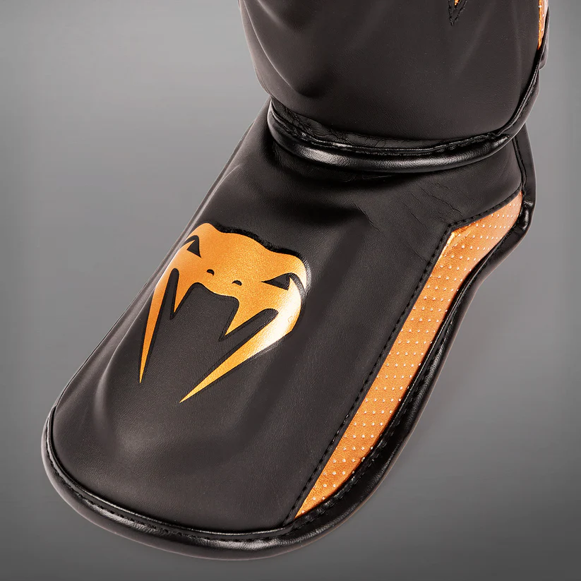 venum canillera elite evo bronce